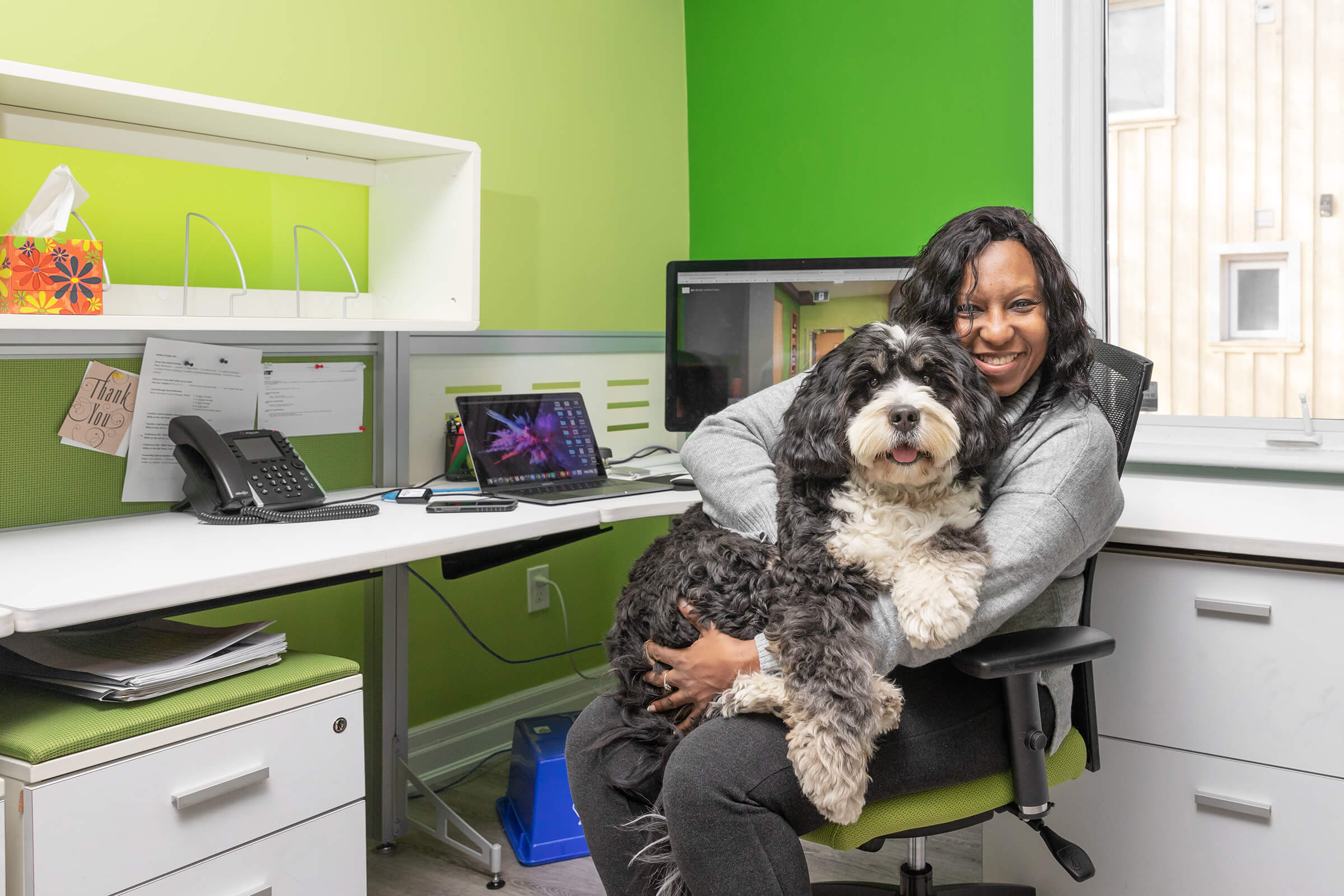 woman and dog in office