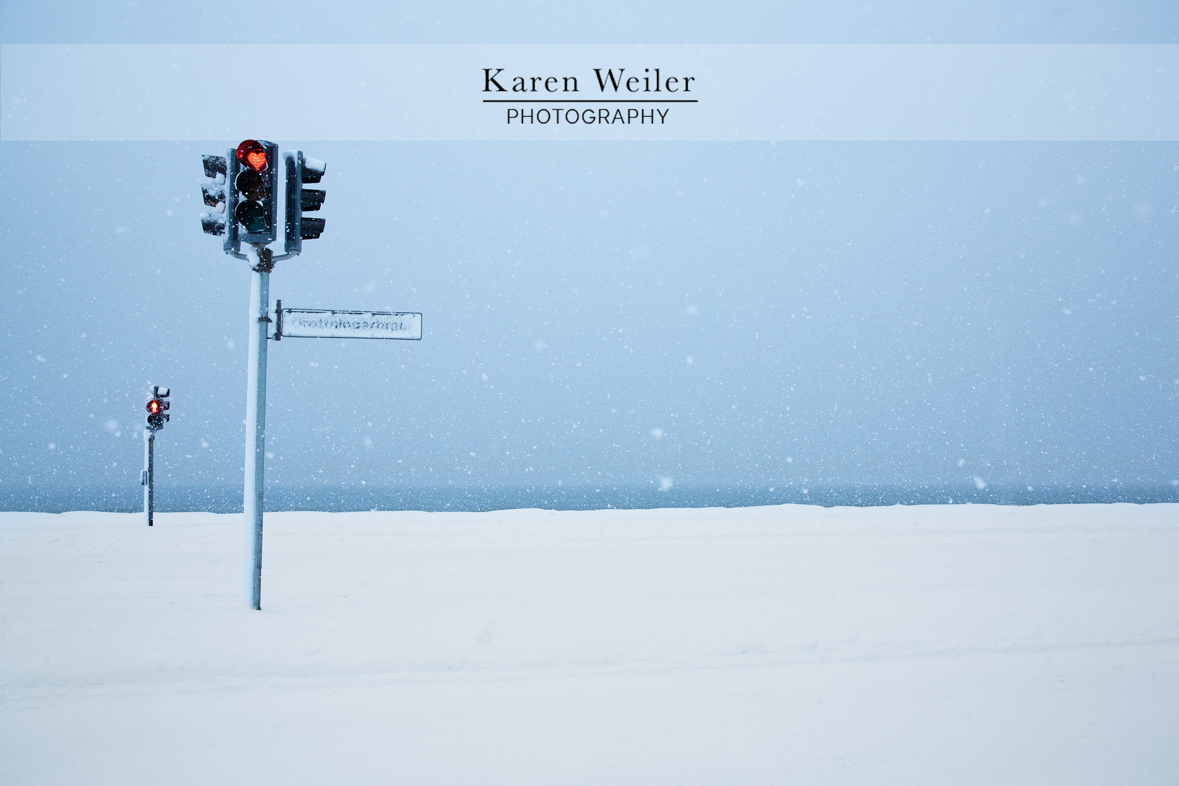 snow storm in Iceland with stoplight - fine art print